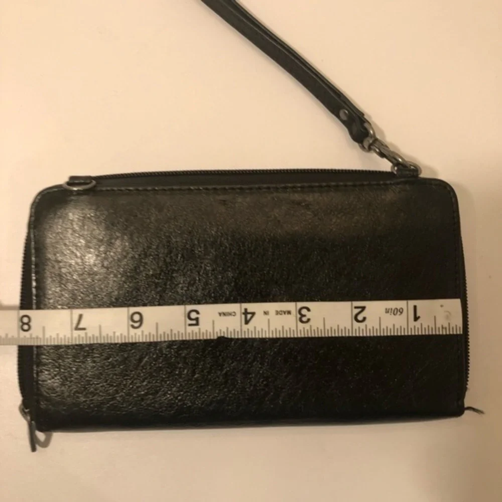 The sak black leather wristlet wallet clutch bag